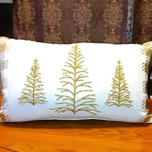Winter wonderland gold ribbon pine pillow deco